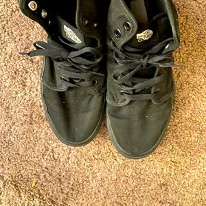 Black high top vans with black laces